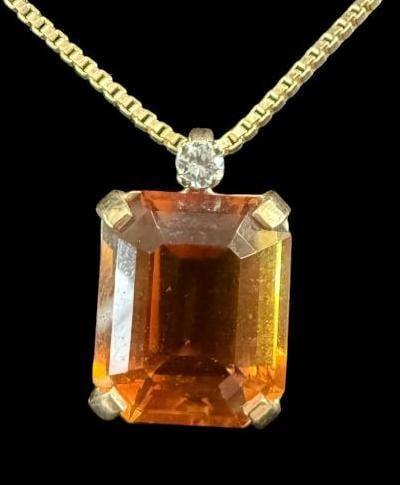 Orange Citrine with Diamond Pendant and 14k Gold Chain: Orange Citrine with Diamond Pendant and 14k Gold Chain. Total weight approx. 5 grams. Clasp to pendant approx. 8.5 inches.