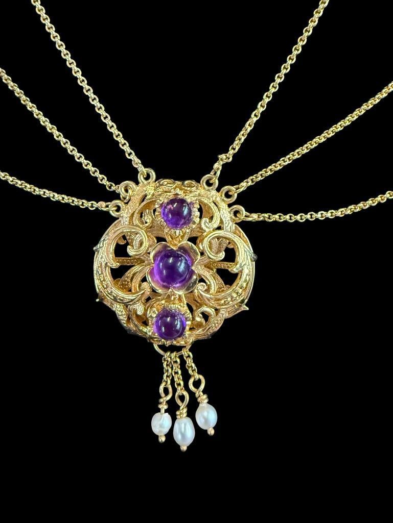 14k Gold Necklace with Amethyst Cabochons: Tests as 14k Gold Necklace with Amethyst Cabochons. Approx. 24 grams. Clasp to pendant approx. 7.5 inches.