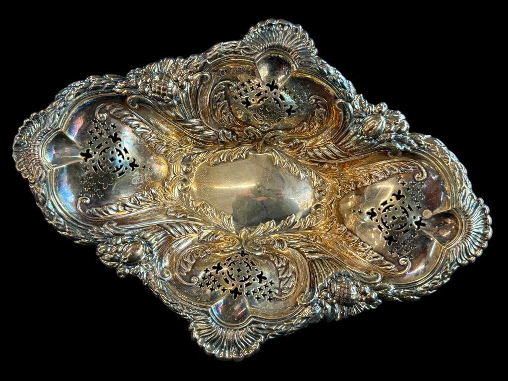 English Hallmarked HA reticulated bowl: English Hallmarked HA reticulated bowl. Approx. 13.3 ozt. Approx. 12.5 x 9 x 3 inches.