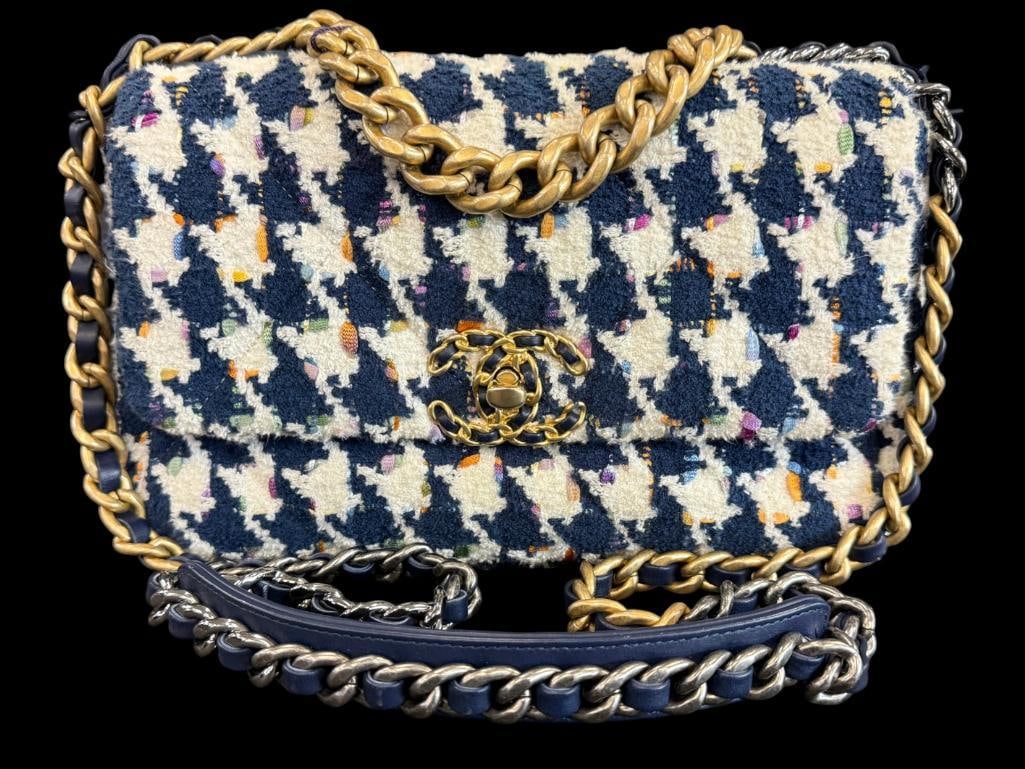 CHANEL 19 Flap Bag: CHANEL 19 Flap Bag with blue, white and multicolor houndstooth tweed. Serial # 31052982. Includes Chanel card. Approx. 11 x 7 x 3 inches. Provenance: From an Italian collector.