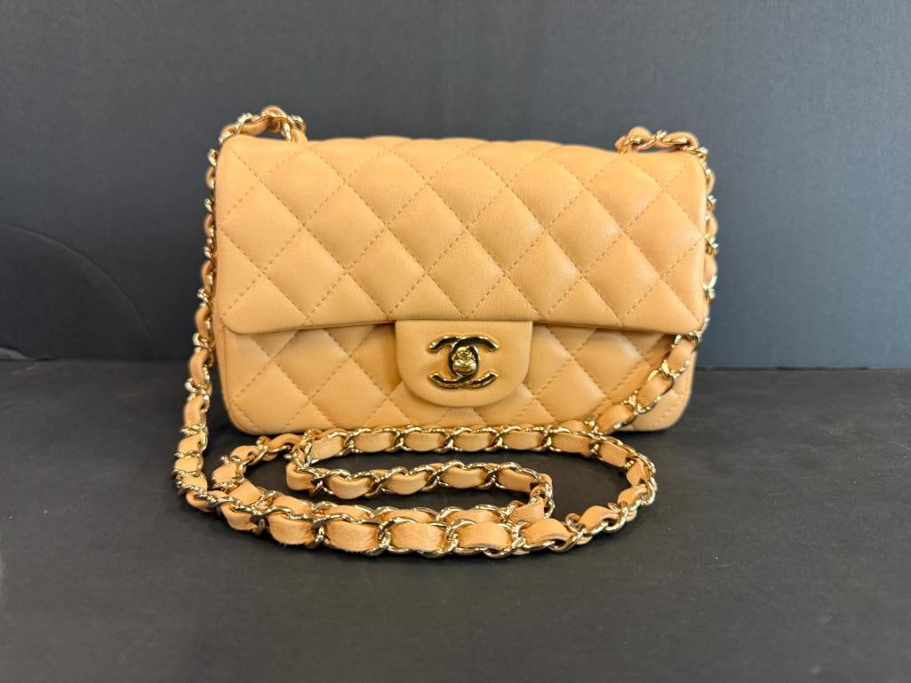 CHANEL Quilted Mini Flap bag: CHANEL Lambskin Quilted Mini Flap bag. Serial # XOXU69GO. Includes entrupy C.O.A. Approx. 8 x 5 x 2.5 inches. Provenance: From an Italian collector.