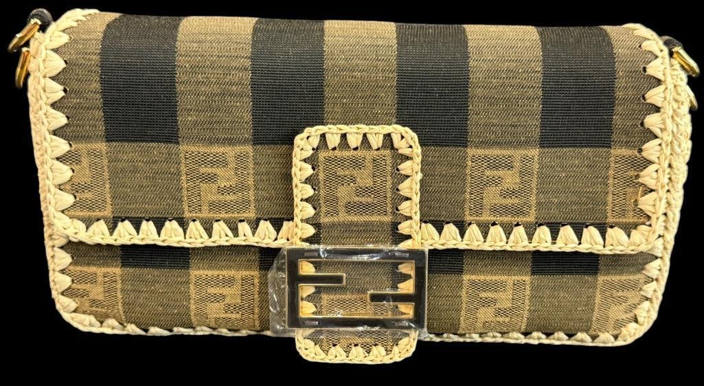 Fendi Pequin Baguette bag: Fendi Pequin Baguette bag, striped canvas with raffia trim. Comes with original bill of sale, pamphlet, hand strap and shoulder strap. Comes with entrupy C.O.A. Approx. 11 x 6 x 3 inches. Provenance: