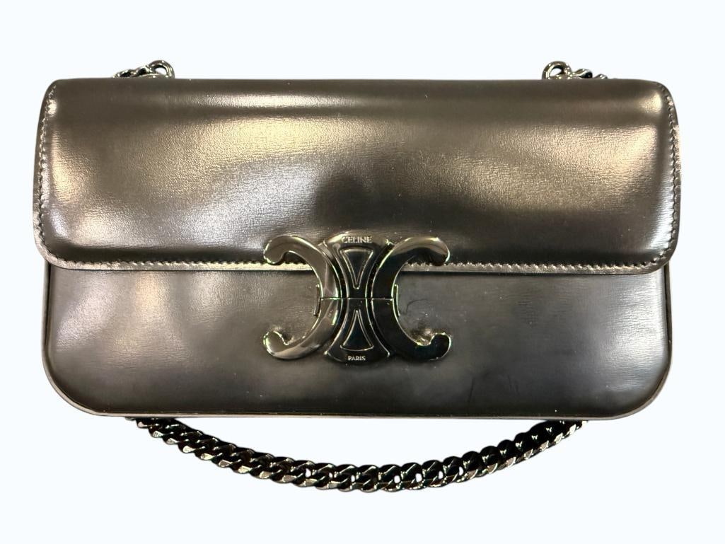 CELINE Triomphe Chain bag: CELINE Shiny Calfskin Triomphe Chain bag. Includes entrupy C.O.A. and paperwork. Serial # W-CU-2292. Approx. 8 x 4.5 x 2 inches. Provenance: From an Italian collector.
