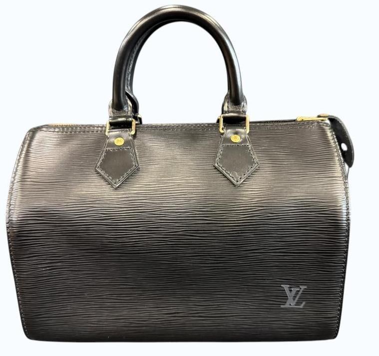 Louis Vuitton Speedy bag: Louis Vuitton Speedy bag in black leather. Serial number VI 0922. Includes shoulder strap, lock, key and felt organizer. Approx. 11 x 8 x 6 inches. Provenance: From an Italian collector.