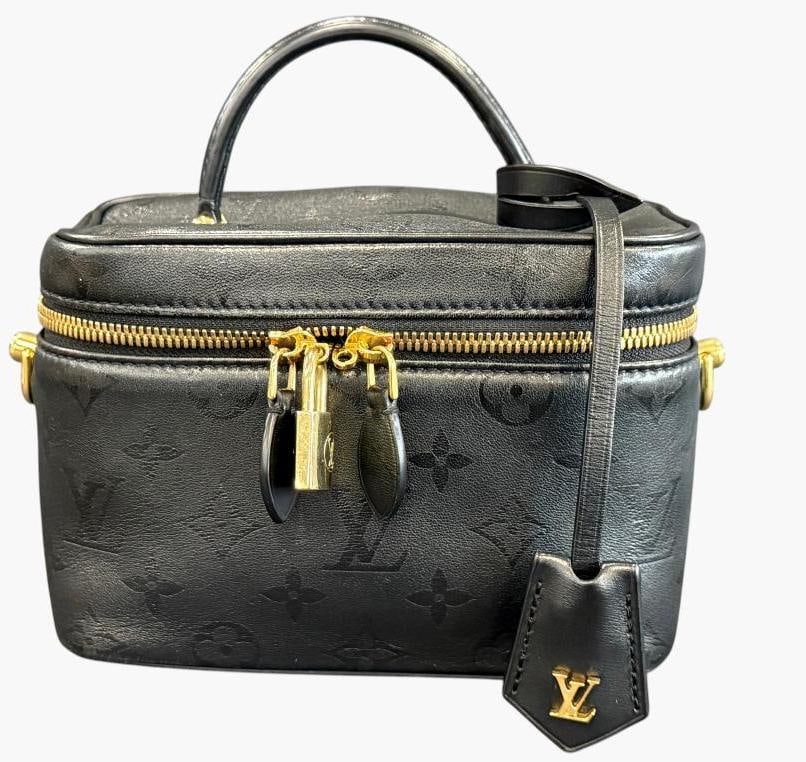 Louis Vuitton Black Monogram Ink Vanity bag: Louis Vuitton Black Monogram Ink Vanity bag. Includes shoulder strap, lock and key. Serial # PL 3220. Includes entrupy C.O.A. Approx. 8 x 6 x 3.5 inches. Provenance: From an Italian collector.