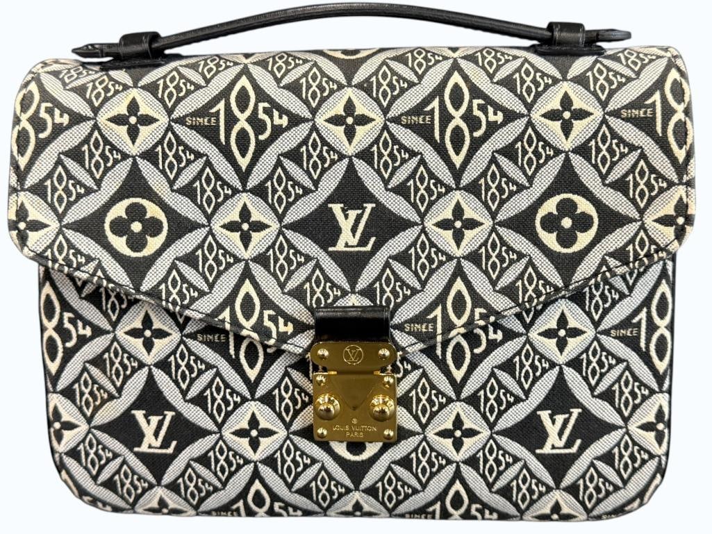 Louis Vuitton Since 1854 Pochette: Louis Vuitton Monogram Jacquard Since 1854 Pochette. Includes shoulder strap. Bag is microchipped. Includes Legitmark C.O.A. Approx. 10 x 8 x 3 inches. Provenance: From an Italian collector.