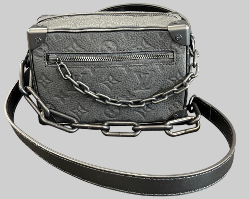 Louis Vuitton Monogram Mini Soft Trunk: Louis Vuitton Monogram Mini Soft Trunk in black Taurillon leather. Bag is microchipped. Includes entrupy C.O.A. Approx. 7.5 x 5 x 3 inches. . Provenance: From an Italian collector.