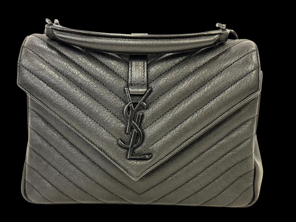 Yves Saint Laurent College leather bag: Yves Saint Laurent College Quilted leather bag. Includes pamphlets and shoulder strap. Approx. 10 x 7 x 2.5 inches. Provenance: From an Italian collector.
