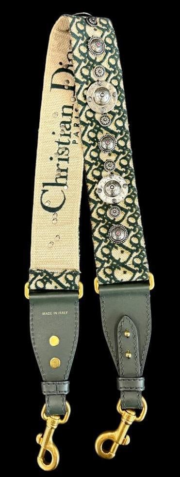 Christian Dior Green Canvas Oblique Studded Bohemian Shoulder Strap: Christian Dior Green Canvas Oblique Studded Bohemian Shoulder Strap. Approx. 36 inches from clip to clip. Provenance: From an Italian collector.