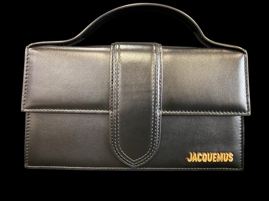 Jacquemus Le Grand Bambino crossbody bag: Jacquemus Le Grand Bambino crossbody bag. Includes shoulder strap. Approx. 9 x 5 x 2.5 inches. Provenance: From an Italian collector.