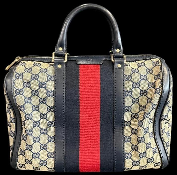 Gucci Web Boston Bag: Gucci Web Boston Bag. Serial # 247205 525040 and QR code. Comes with shoulder strap and removable felt organizer. Approx. 14 x 9 x 7 inches. Provenance: From an Italian collector.