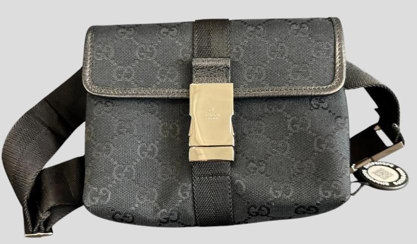 Gucci GG Canvas Belt bag: Gucci GG Canvas Belt bag. Serial # 131236 001998. No QR code. Approx. 7 x 6 x 2 inches. Provenance: From an Italian collector.