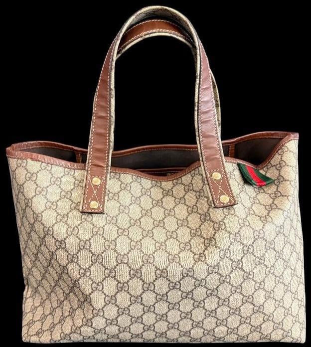 Gucci GG Supreme Coated Canvas tote: Gucci GG Supreme Coated Canvas Web Loop tote. Serial 211134 001998 and QR code. Approx. 14 x 12 x 4 inches. Provenance: From an Italian collector.