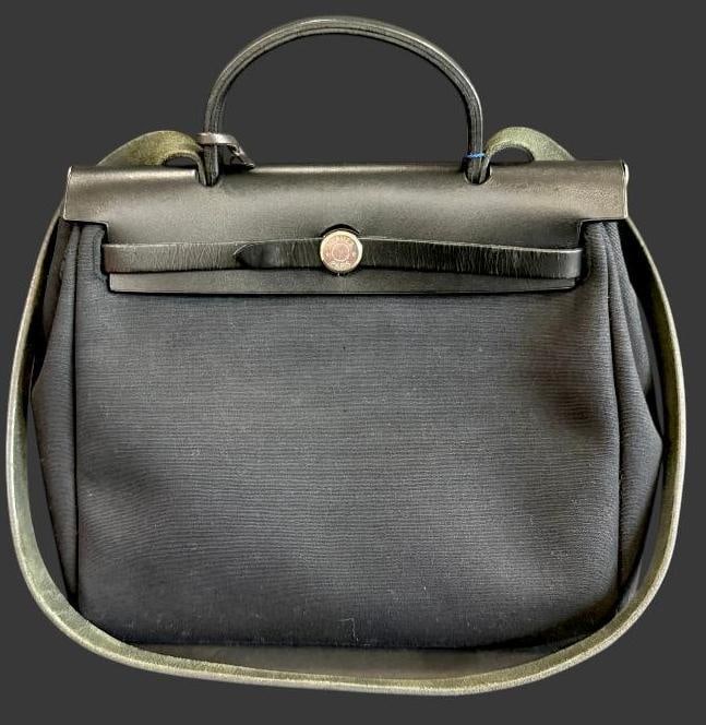 HERMES Herbag: HERMES Herbag bag. Includes lock, key and converting instructions. Approx. 12 x 11 x 4 inches. Provenance: From an Italian collector.