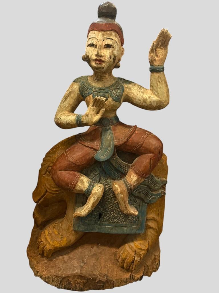 Carved wood Burmese statue: Carved wood Burmese statue of a dancer or deity. Approx. 31 x 16 x 10 inches.