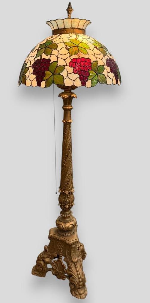 Antique Leaded Glass Floor Lamp: Leaded Glass Floor Lamp. Shade with grapes designs. Approx. 72 inches tall. Shade approx. 24 x 24 x 14 inches.