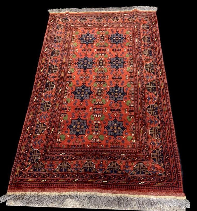 Handmade Oriental rug: Handmade Oriental rug with geometric motifs. Approx. 80 x 50 inches.