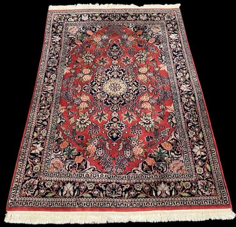 Handmade Oriental rug: Handmade Oriental rug. Tabriz design. Approx. 6'6" x 3'11".