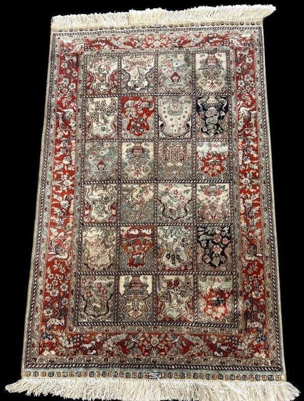 Signed Handmade Silk Pictorial rug: Signed Handmade Silk Pictorial rug with animal and floral designs. Approx. 48 x 30 inches.