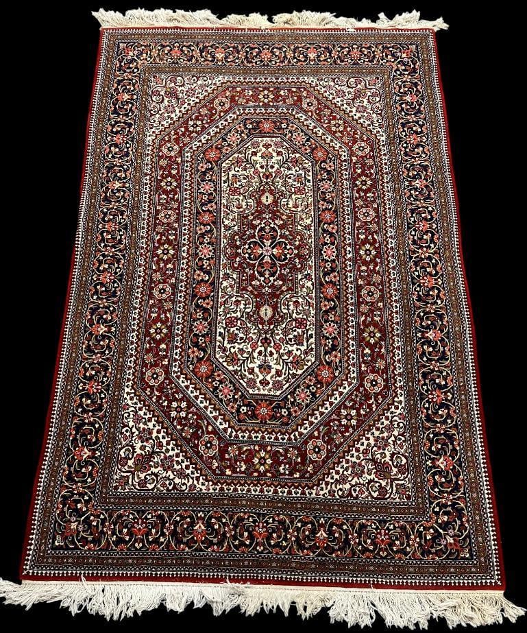 Handmade Persian rug: Finely woven handmade Persian rug. Tabriz design. Approx. 86 x 55 inches.
