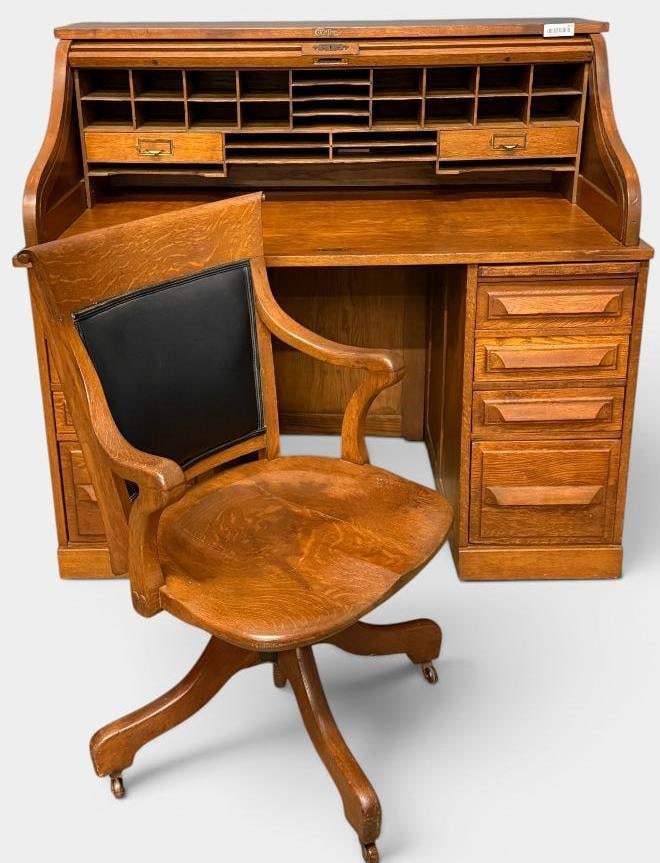 Antique Cutler Roll Top Desk: Antique Cutler Oak Roll Top Desk with chair. Approx. 46 x 50 x 30.5 inches.