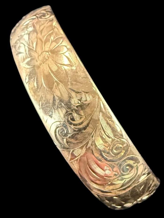 10k Gold Bracelet: 10k Gold Bracelet. Approx. 21.4 grams. Approx. 2 3/8 inside across.