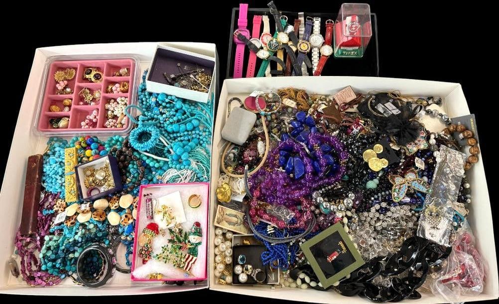 Large Group of Costume Jewelry: Large Group of Costume Jewelry. Including necklaces, Christmas pins, watches, earrings, sterling bracelet and more.