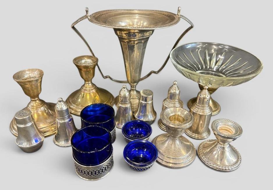Sterling Silver weighted items: Sterling Silver weighted items. 16 pieces. Candlesticks, salt / peppers and more.
