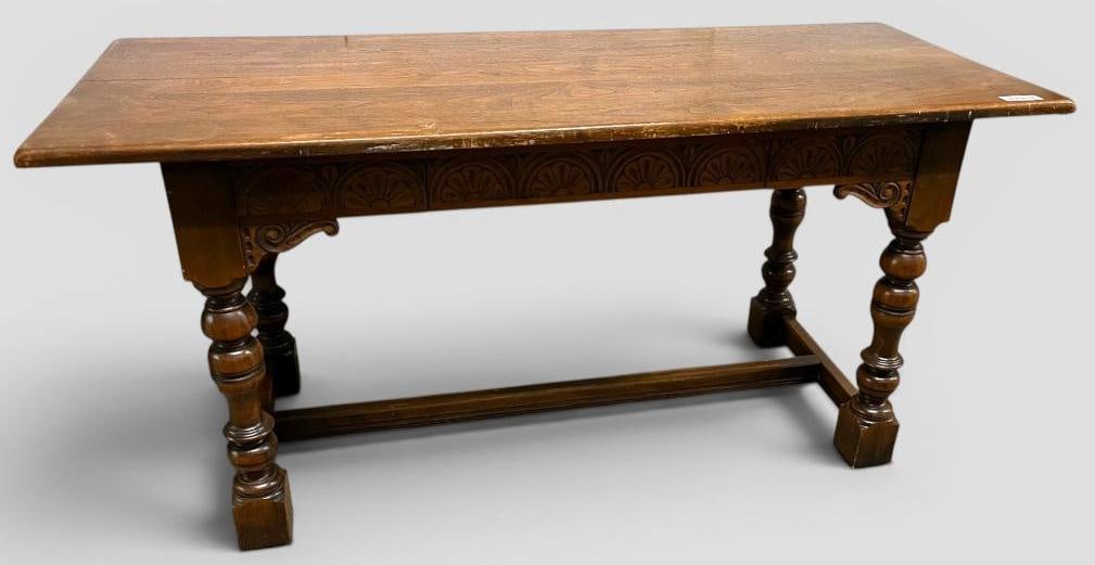 Kittinger Oak Library Table: Kittinger Oak Library Table. Approx. 63 x 30 x 25 inches.