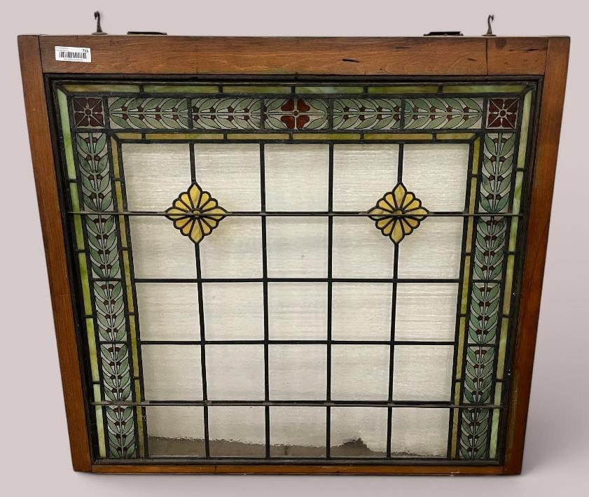 Leaded Glass Window with Floral Designs: Leaded Glass Window with Floral Designs. Approx. 38 x 34.5 inches. Frame approx. 41.5 x 38.5 inches. Local pickup of 3rd party shipping only.