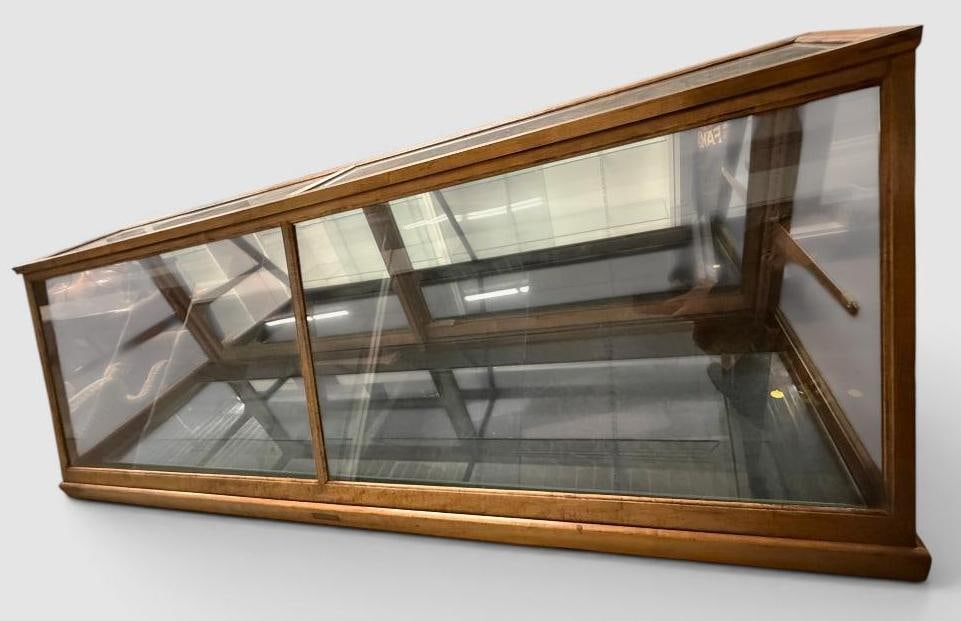 Countertop Glass and Wood display case: Countertop Glass and Wood display case. Approx. 71 x 23.5 x 22.5 inches.