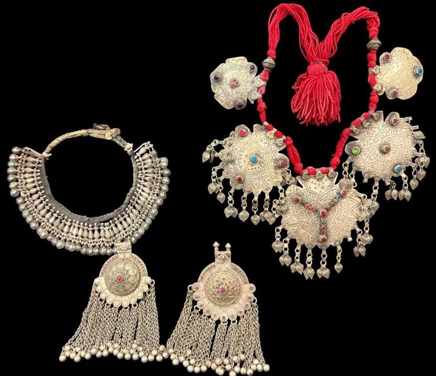 Persian Necklaces and Pendants: Persian Necklaces and Pendants. 4 pieces. Largest case approx. 21 x 17 inches.