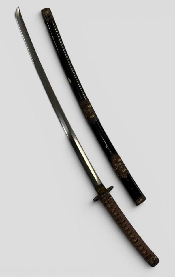 Japanese Katana with scabbard: Japanese Katana with insect decorated scabbard. Approx. 42 inches in scabbard.