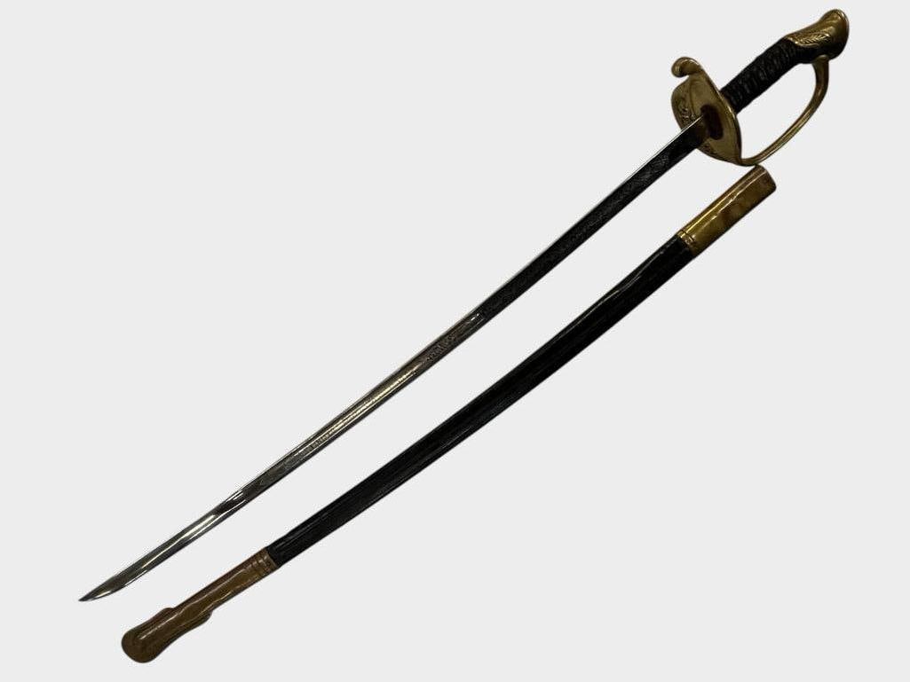 Horstmann Co. U.S. Marines Sword: Horstmann Co. U.S. Marines Sword. Blade is etched nicely. Approx. 34 x 6 x 4 inches.