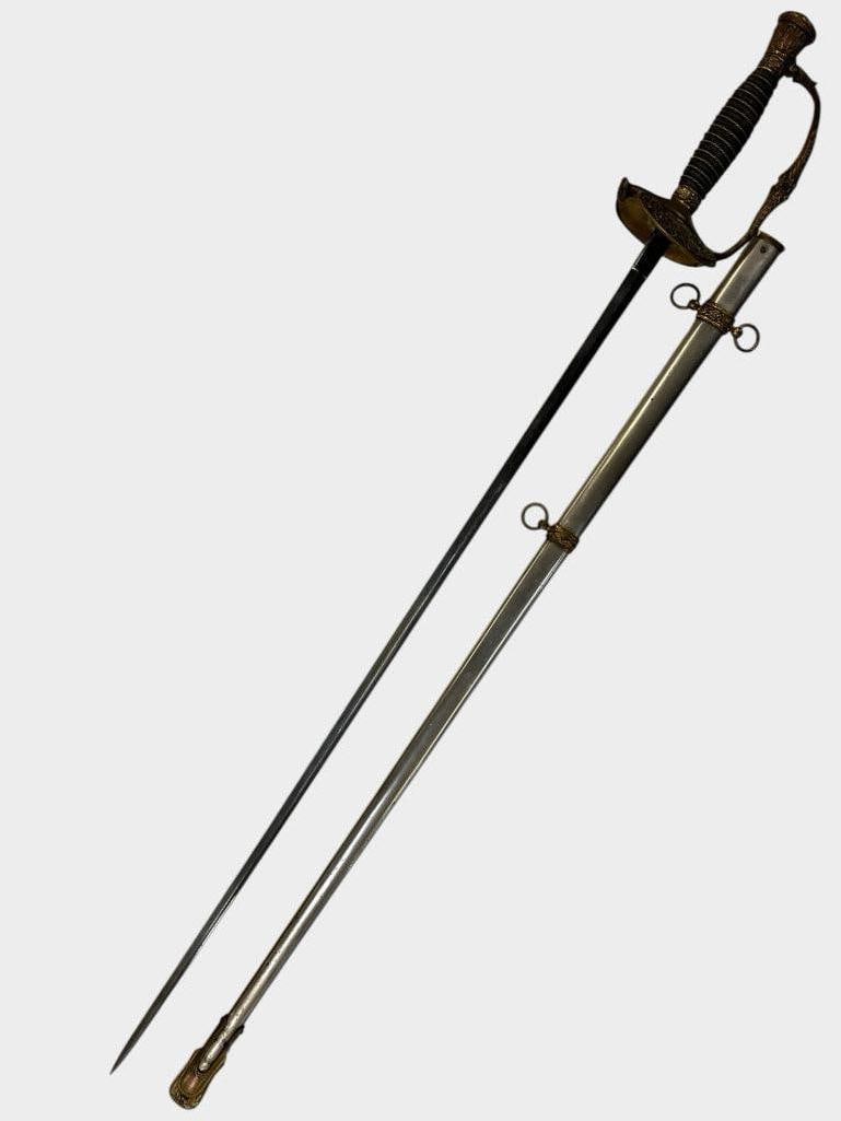 U.S. Model 1860 Staff and Field Officers Sword: U.S. Model 1860 Staff and Field Officers Sword. Blade is etched with Name James Chester. Sword in scabbard approx. 38 x 5 x 3 inches.