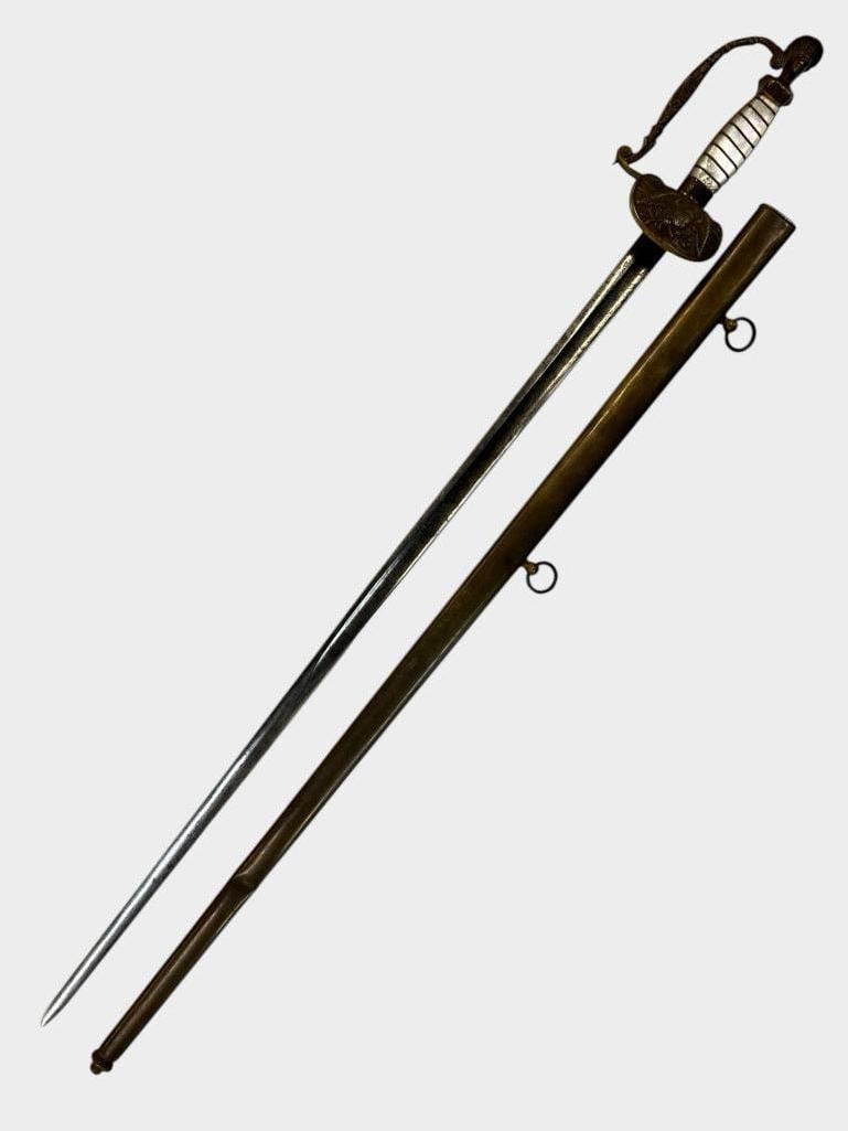 19th Century Indian Princess Pommel Sword: 19th Century Militia Indian Princess Pommel Sword with mother of pearl handle. Blade is finely etched. Sword in scabbard approx. 35 x 4 x 2 inches.