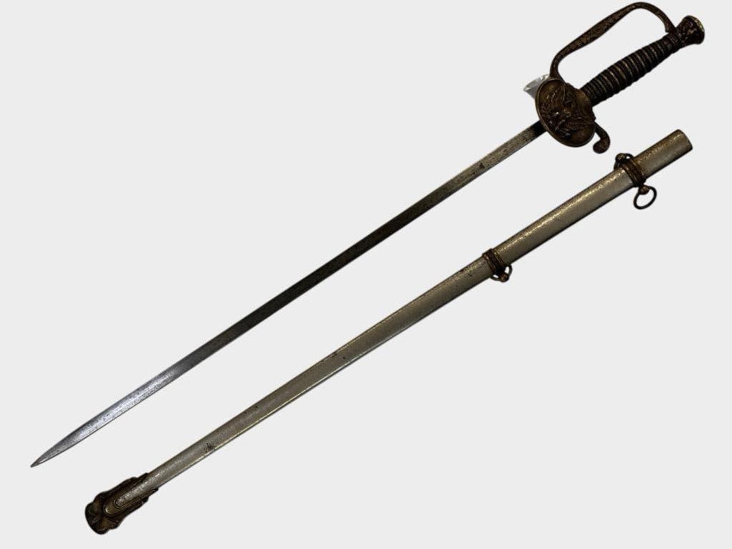 U.S. Staff and Field Sword: U.S. Staff and Field Sword. Sword in scabbard approx. 29 x 4 x 2 inches.