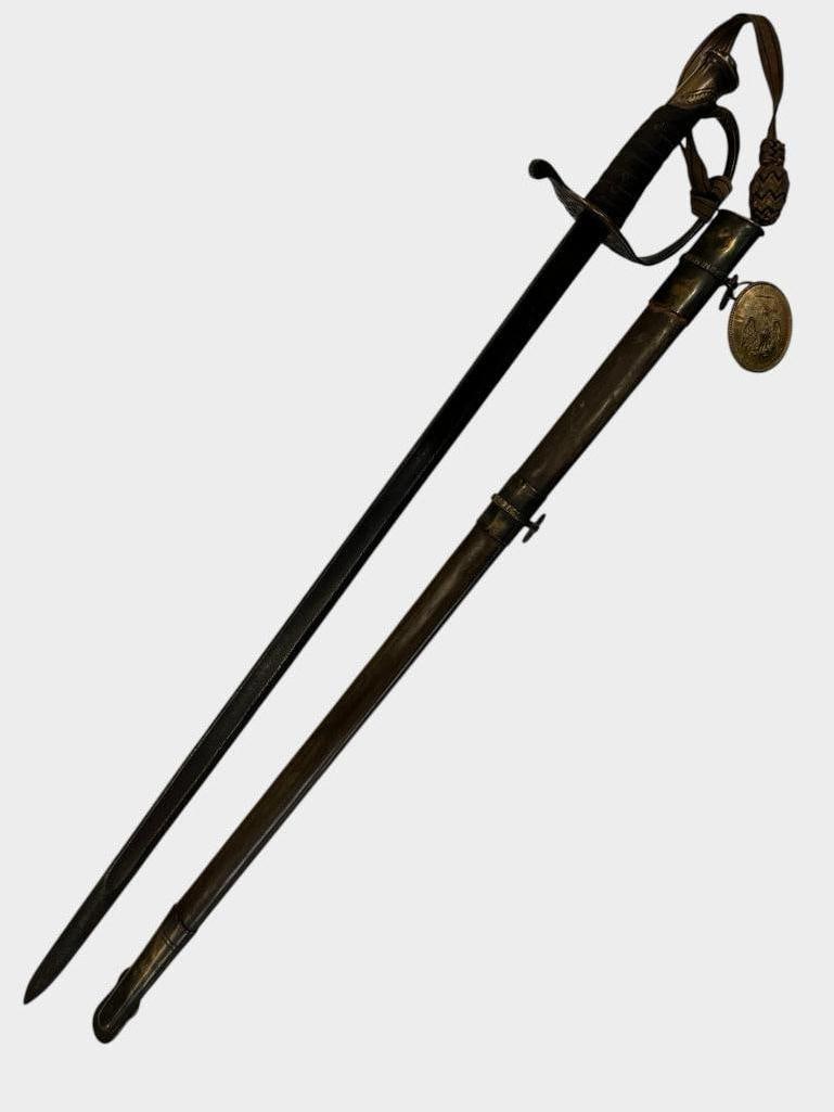 Cook & Brother CS 1862 Sword: Cook & Brother marked CS 1862 Sword with Louisiana Militia belt plate. Sword with scabbard approx. 38 x 6 x 6 inches.