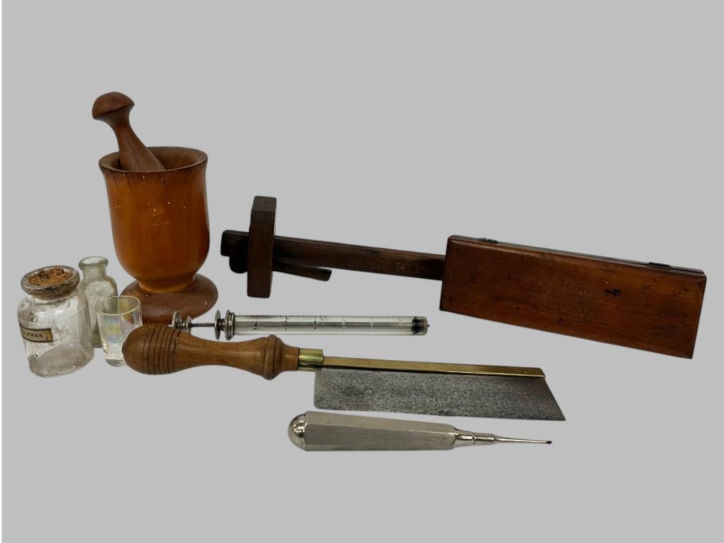 Named Surgeons instruments: Named Surgeons instruments. William H. Rice NY 81st Infantry. Including implement case with name and regiment, bone saw with name and regiment, mortar and pestle and more. Surgeon who first treated