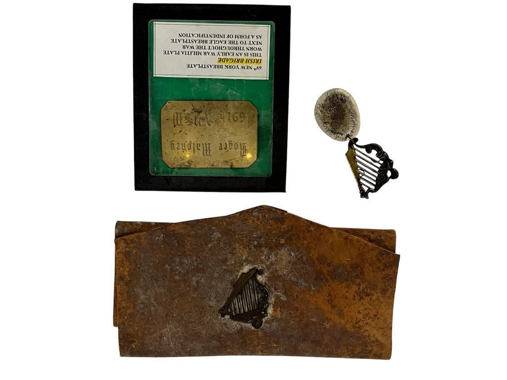 Named Irish Brigade items etc.: Named Irish Brigade items and more. 3 pieces. Thomas Geary B Co. NY 88th Infantry Irish Brigade cap device with bone I.D. disc attached with his name and regiment. Roger Maloney E Co. NY 69th