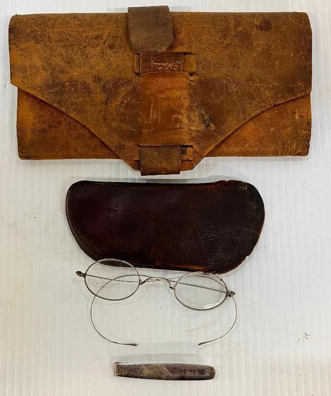 Named Money Clip, Eyeglasses and Wallet: Named Money Clip, Eyeglasses and Wallet. 3 pieces. Nicholas Weber B Co. NY 140th Infantry money clip with initials. John B. Snyder G Co. NY 140th Infantry wallet with name and regiment under flap.