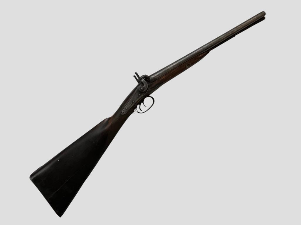 T. Bland & Sons marked shotgun: T. Bland & Sons marked double barrel shotgun. London Fine Twist marked between barrels. Overall length approx. 36.5 inches.