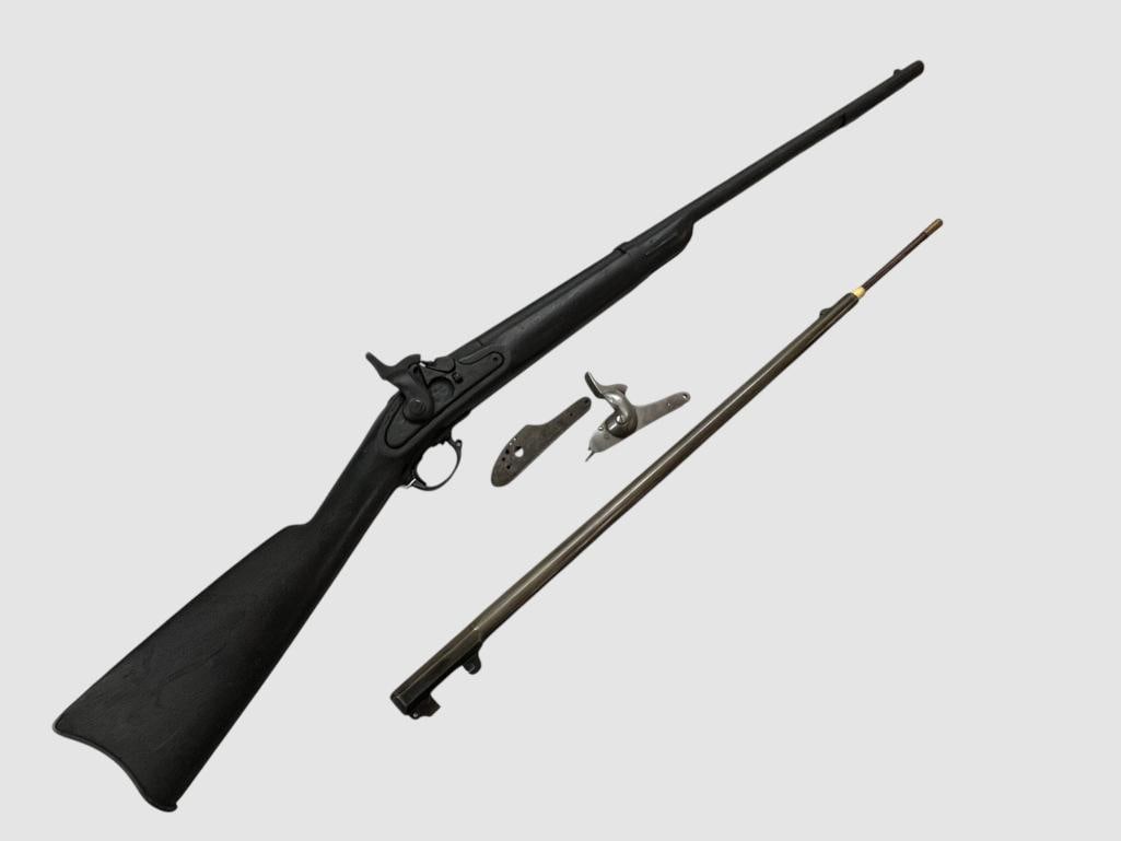 Reenactors Prop Musket: Reenactors Prop Musket. Has wood and metal barrel. Includes extra metal barrel and side plates. Overall length approx. 47 inches.