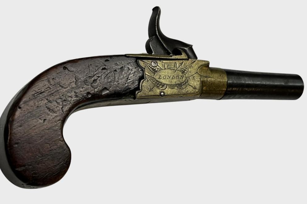 T. Ketland & Co. Percussion Pistol: T. Ketland & Co. London Percussion Pistol with folding trigger. Overall length approx. 6.75 inches.