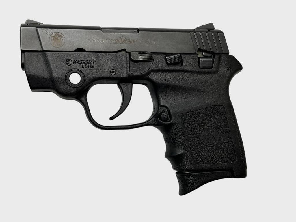 Smith & Wesson Bodyguard 380: Smith & Wesson Bodyguard semi auto pistol 380 with Insight laser. Serial # EBX0740. Includes 2 magazines, holster and instruction manual. Overall length approx. 5 inches.