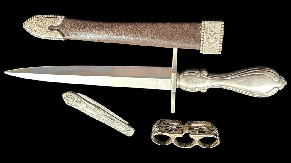 Dagger, pocket knife and 3 finger ring: Dagger, pocket knife, small sterling dish and 3 finger ring. 4 pieces. Pocket knife engraved W.E. Cook. Dagger approx. 12 inches.