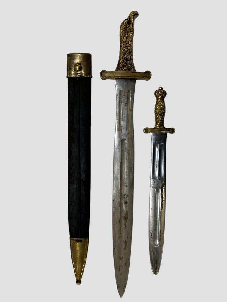 2 Artillery Officer style short swords: 2 Artillery Officer style short swords. Larger approx. 26 inches with Eagle head handle.
