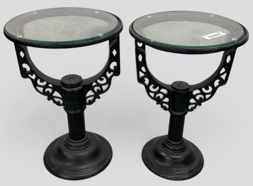 2 Industrial Side Tables: 2 Industrial Cast Side Tables. These are repurposed water heater stands. One is by Bignall Mfg. Co. Approx. 19.5 x 12.5 x 12.5 inches.