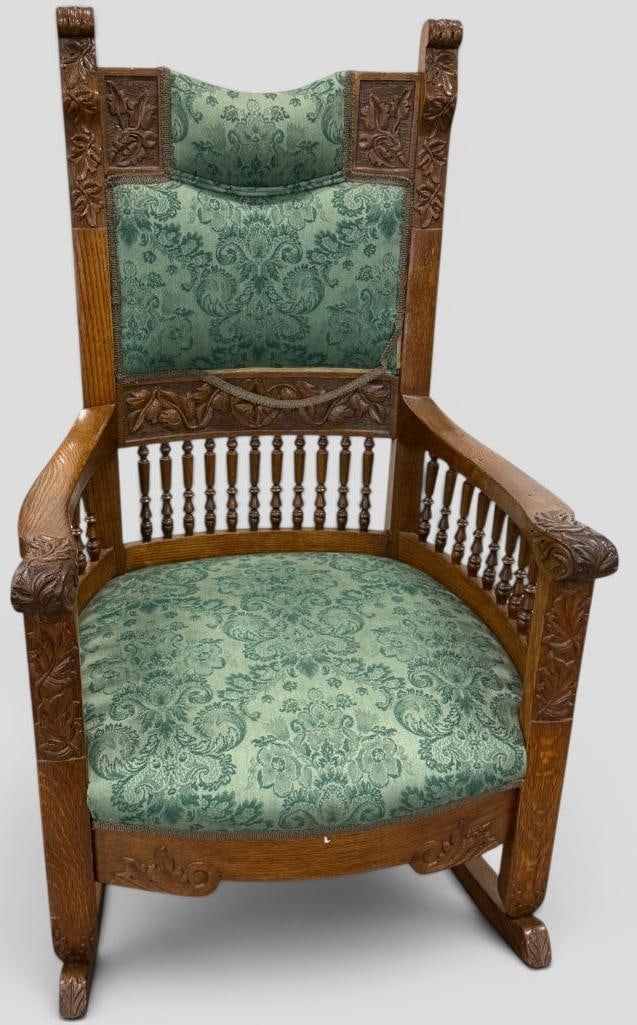 Nicely Carved Oak Rocking Chair: Nicely Carved Oak Rocking Chair. Approx. 44 x 26 x 35 inches.