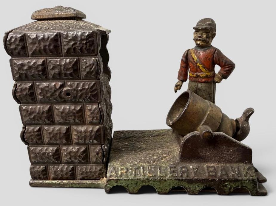 Artillery Mechanical Bank: Antique Artillery Mechanical Bank. Approx. 8 x 6 x 3 inches.